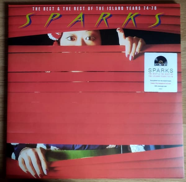 Album Cover Art for The Best & The Rest Of The Island Years 74-78